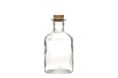 Liten glasflaska med kork. Använd som ljusstake för kronljus eller som liten vas för blommor.